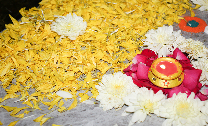 Decorated office with Diya's and Flowers 